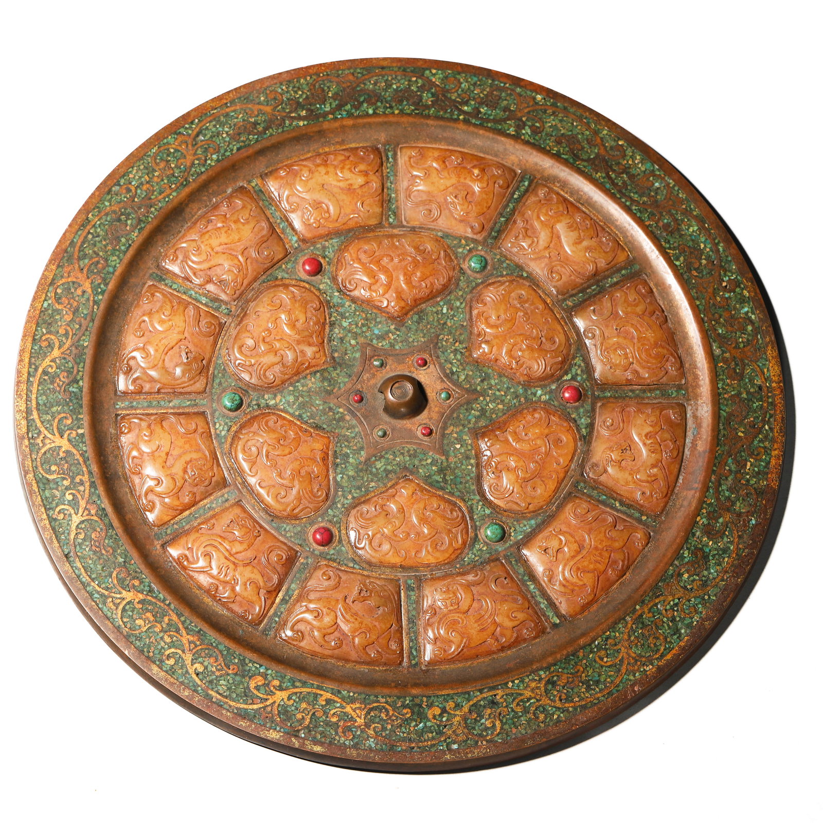 A BRONZE MIRROR WITH JADE INLAY. (1 of 6)