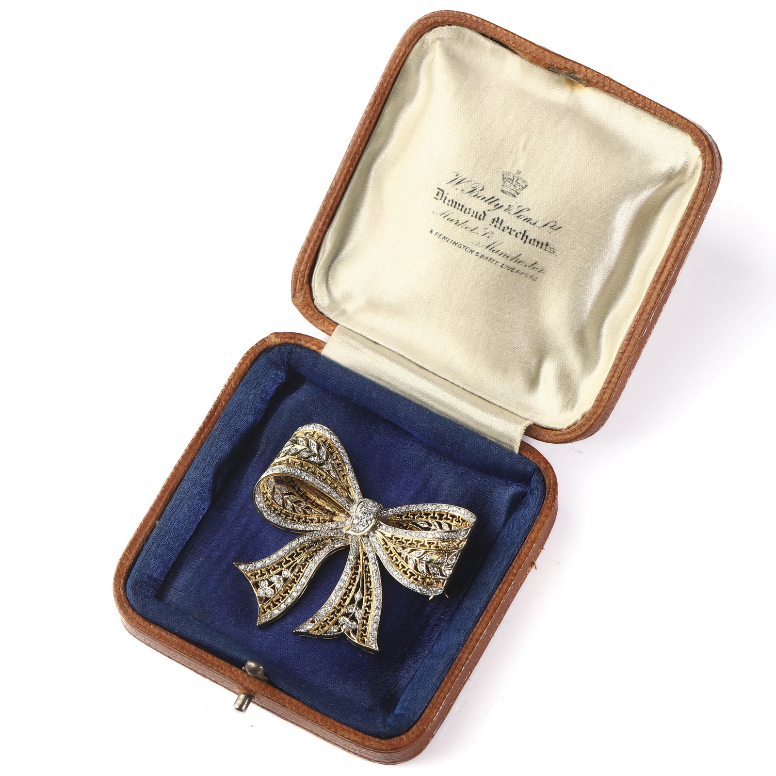 FRENCH ART DECO 18K GOLD DIAMOND BOW BROOCH: Dimensions Length 1 5/8 in (41 mm) Width 1 37/64 in (40 mm) Weight 14.3 g Description Art Deco Period (1925–1935). A refined European antique brooch finely handcrafted in 18K gold, designed in an el