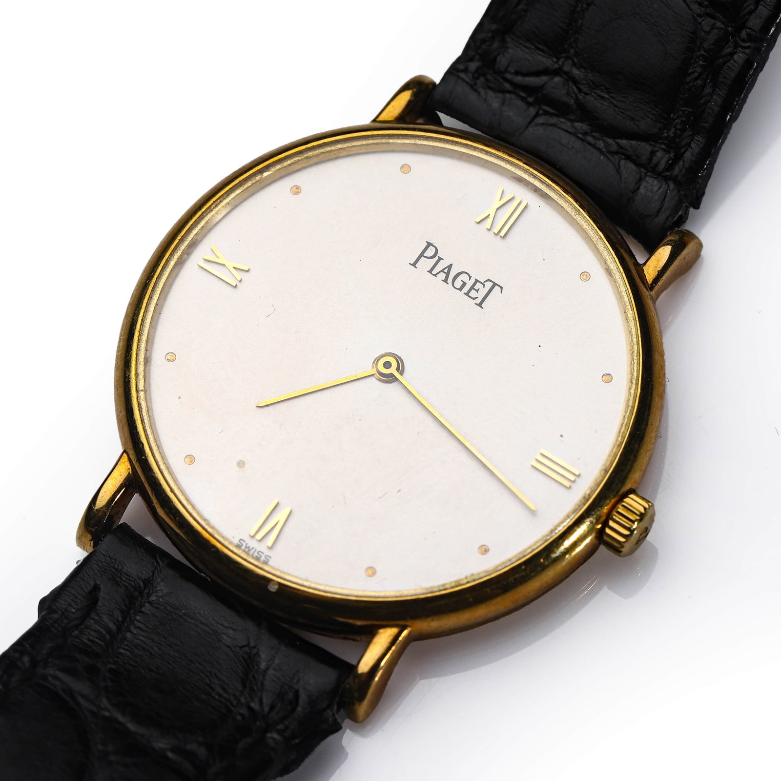 PIAGET 18K GOLD MANUAL-WIND WRISTWATCH: Dimensions Case diameter approx. 1 1/4 in. (31.8 mm); overall length approx. 8 7/8 in. (22.5 cm). Description An elegant gentleman’s wristwatch by Piaget, executed in 18K yellow gold and
