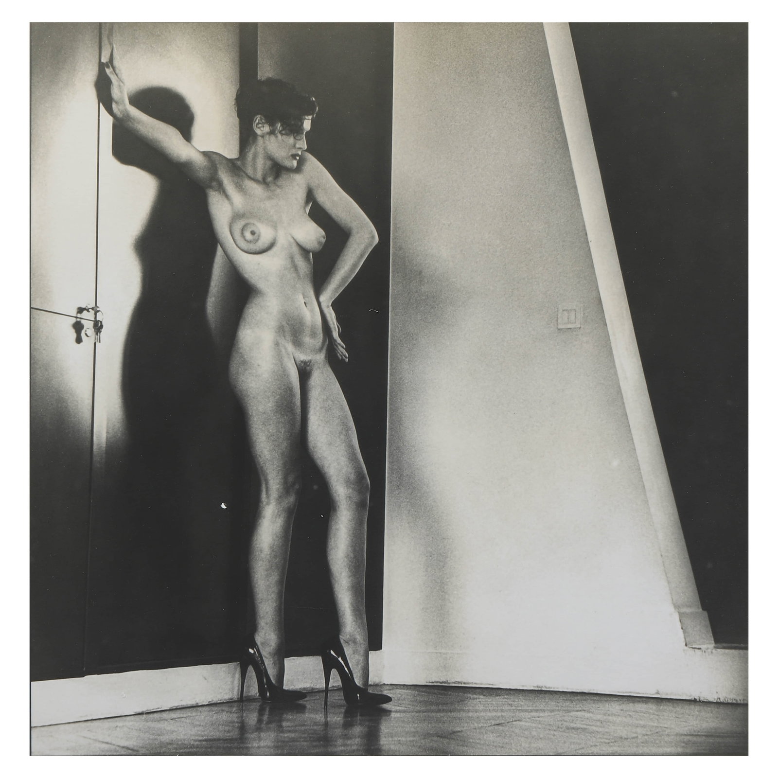 HELMUT NEWTON (1920–2004), SYLVIA IN MY STUDIO, PARIS: Artist Helmut Newton Title Sylvia In My Studio, Paris Medium Silver gelatin print, mounted on board Signature Signed on verso Dimensions Photograph: 11 × 10 7/8 in. (27.8 × 27.5 cm) Frame: 19 3/4