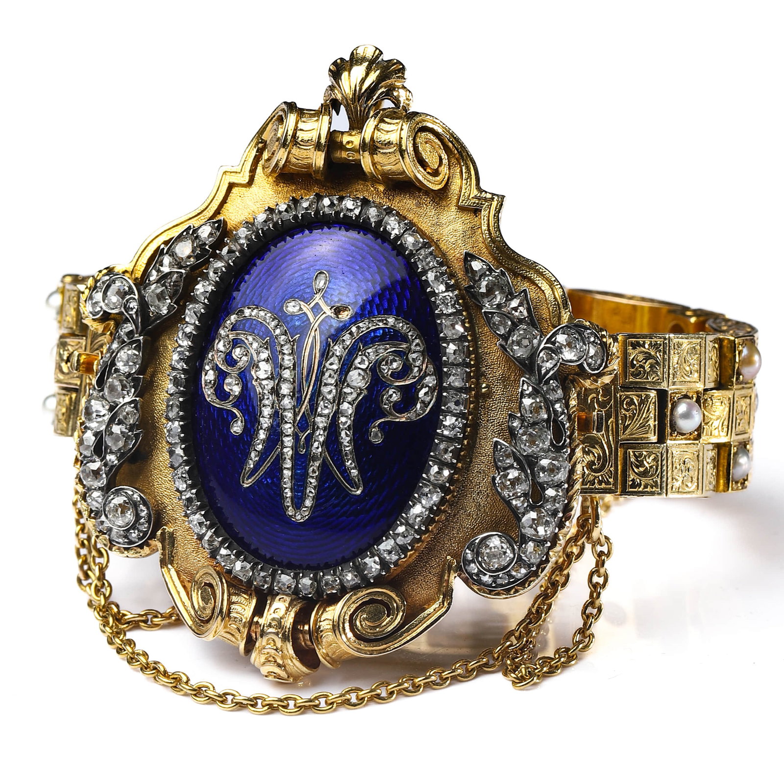 VICTORIAN GOLD, DIAMOND, ENAMEL AND PEARL BRACELET WITH LOCKET: Dimensions Diameter: 4 3/4 in. (12 cm) Description A finely crafted Victorian yellow gold bracelet centered with an oval locket plaque decorated in deep cobalt blue guilloché enamel. The central moti