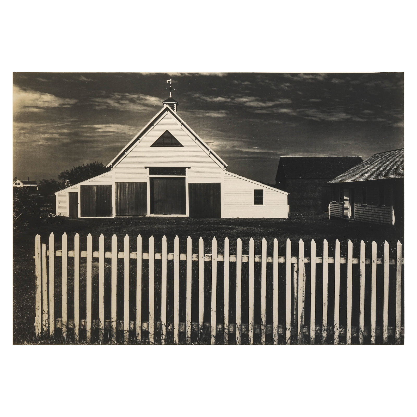 ANSEL ADAMS (1902–1984), BARN, CAPE COD, MASSACHUSETTS: Artist Ansel Adams Title BARN, CAPE COD, MASSACHUSETTS Medium Silver gelatin print, mounted on board Signature Signed in pencil, lower right recto Dimensions Image 11.02 × 15.83 in. (28 × 40.2 cm); 