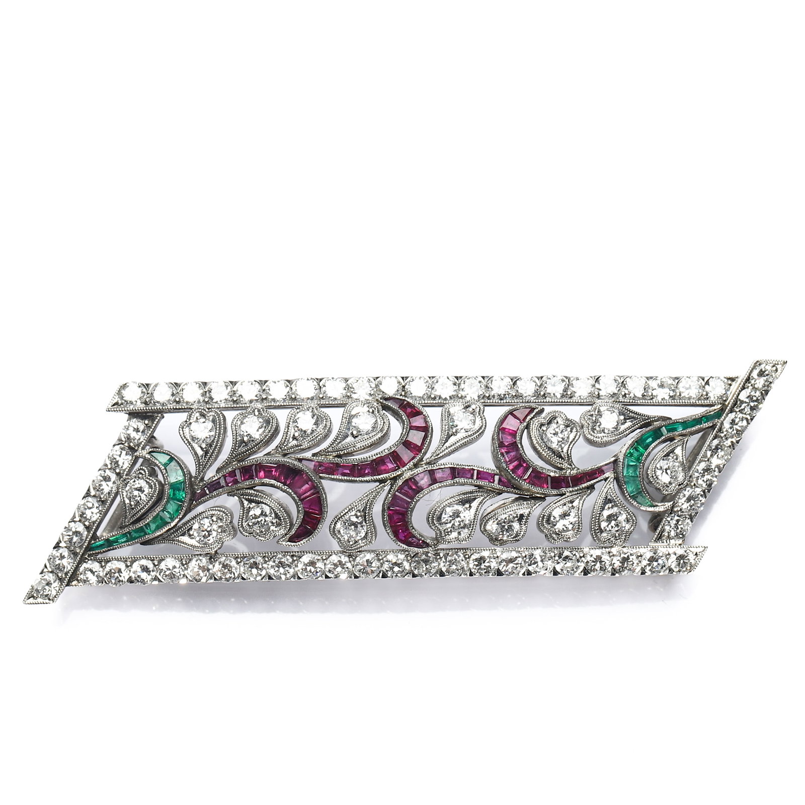 AN ART DECO ITALIAN PLATINUM, DIAMOND, EMERALD AND RUBY PENDANT: Dimensions Length 2 1/2 in. (6.3 cm), Width 3/4 in. (1.9 cm)Weight: 15 g Description An Art Deco period (1925–1935) Italian pendant, finely crafted in platinum and set with diamonds, emeralds, and