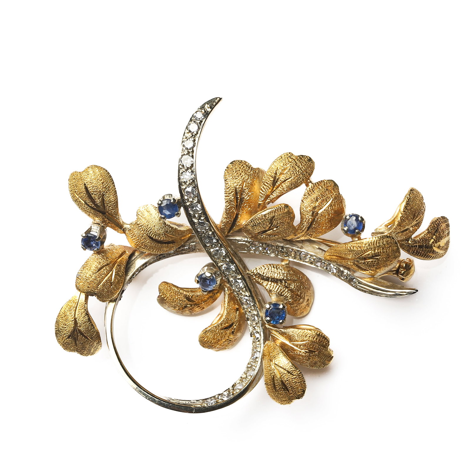 RETRO PERIOD, AN ITALIAN TWO-TONE GOLD AND DIAMOND BROOCH: Dimensions 1 7/8 × 1 7/16 in. (47 × 36 mm); Weight: 11.9 g Description An Italian custom-made brooch from the Retro period, finely crafted in 18K two-tone gold. The design features sculptural hand-c