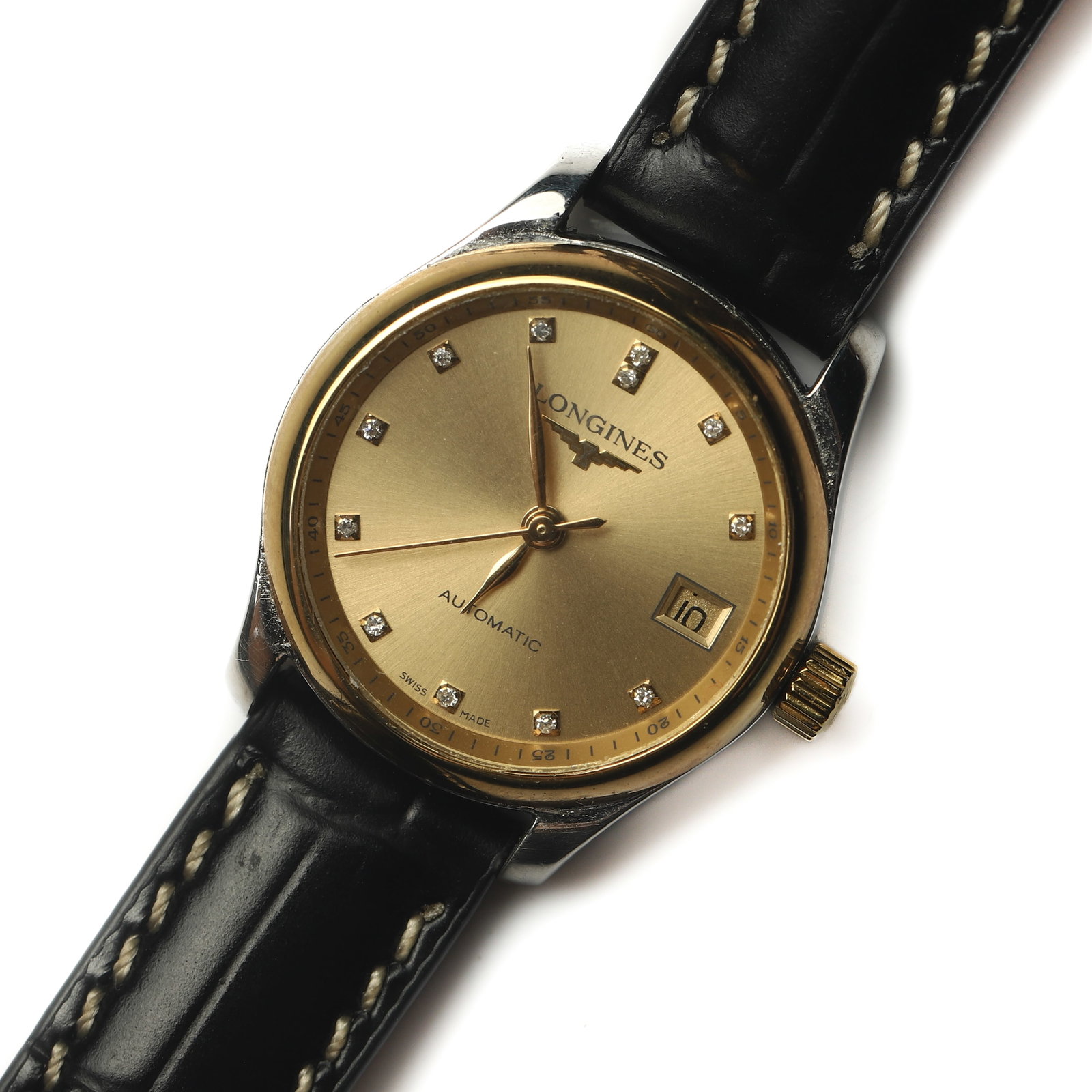 LONGINES MASTER COLLECTION AUTOMATIC STAINLESS STEEL WRISTWATCH: Dimensions Case diameter 1 1/8 in. (2.8 cm) Overall length 9 1/16 in. (23 cm) Weight 33.7 g Description A Longines Master Collection automatic wristwatch featuring a champagne sunburst dial with