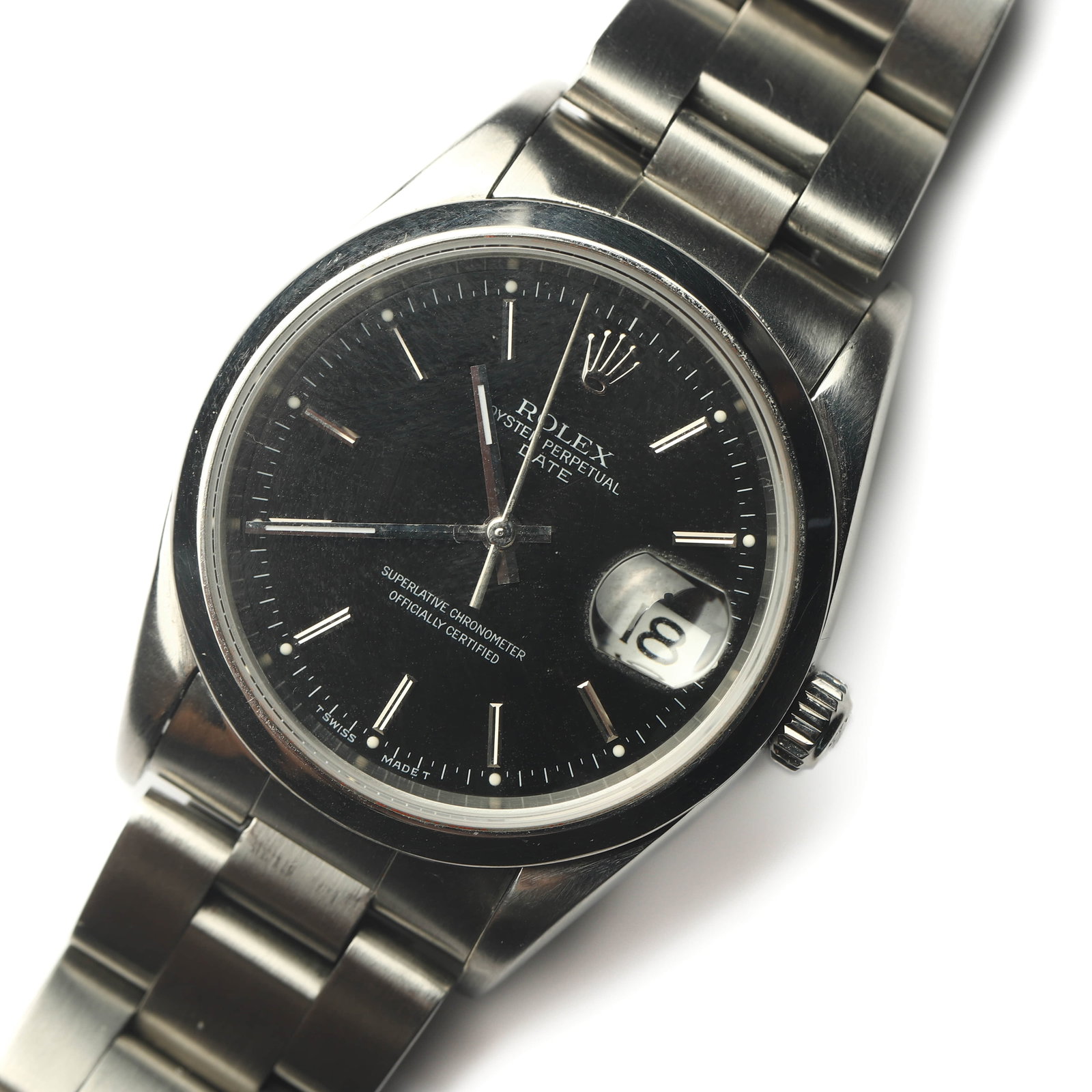 ROLEX OYSTER PERPETUAL DATE STAINLESS STEEL AUTOMATIC WRISTWATCH: Dimensions Case Diameter: 1 7/16 in. (36.8 mm) Weight: 94.9 g Description A Rolex Oyster Perpetual Date automatic stainless steel wristwatch featuring a black dial with applied baton hour markers,