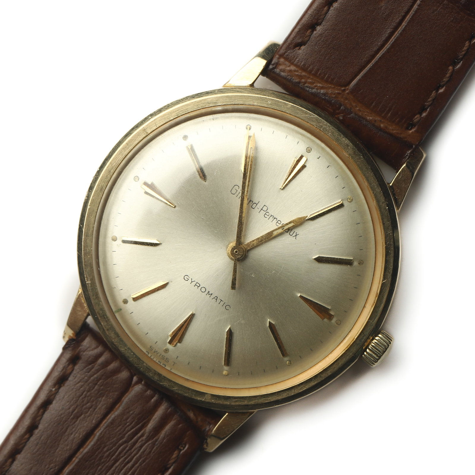 GIRARD-PERREGAUX GYROMATIC 14K GOLD AUTOMATIC WRISTWATCH: Dimensions Overall Length: 9 1/4 in. (23.5 cm) Case Diameter: 1 7/16 in. (36 mm) Weight: 33.3 g Description A Girard-Perregaux Gyromatic automatic wristwatch housed in a 14K gold case with a silver