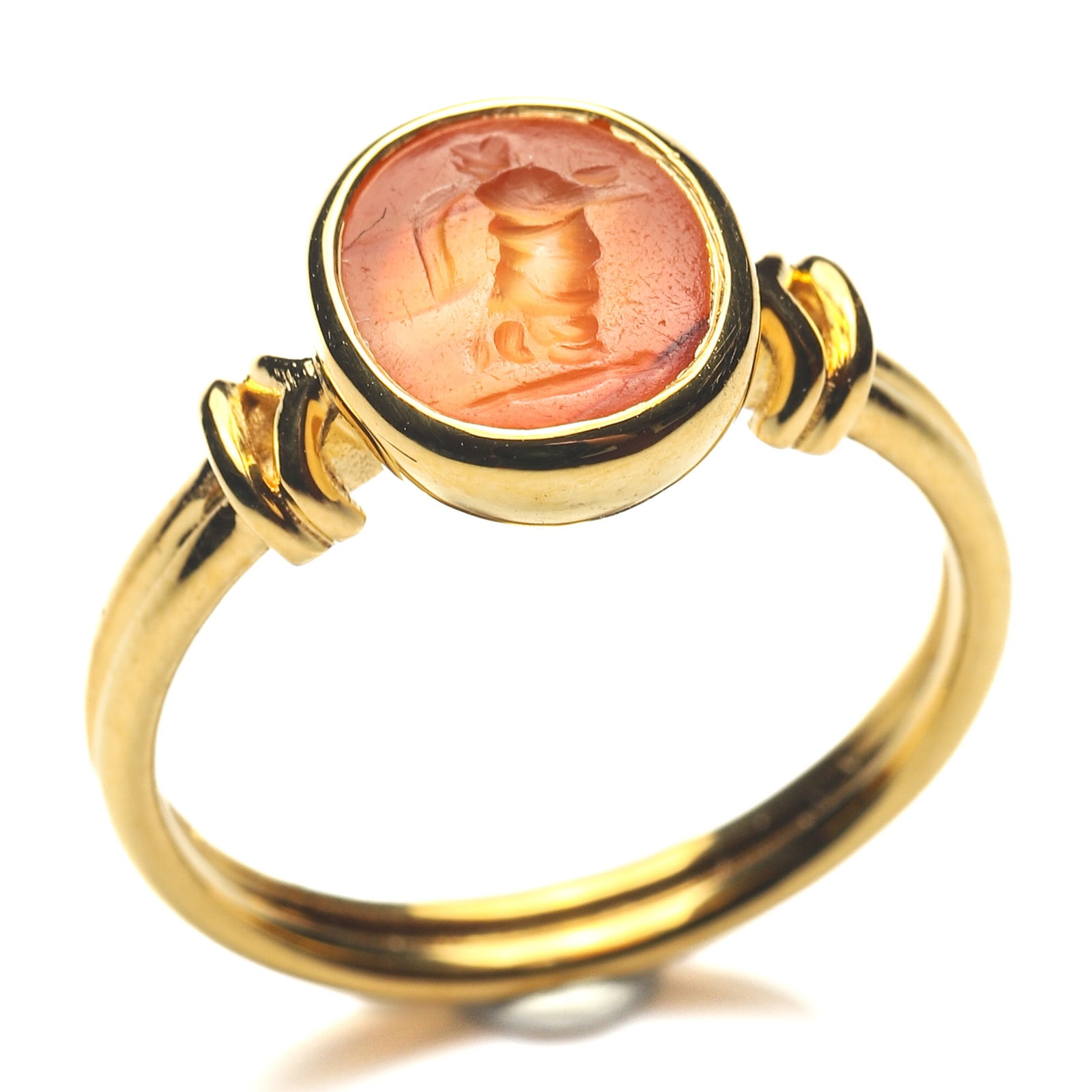 ANCIENT ROMAN NIKE AGATE INTAGLIO GOLD RING: Dimensions Ring Size HK 13; Face 3/8 × 3/8 in. (1.0 × 0.9 cm) Weight 3.9 g Description An Ancient Roman gold ring featuring a finely carved agate intaglio depicting Nike, the Goddess of Victory. Rev