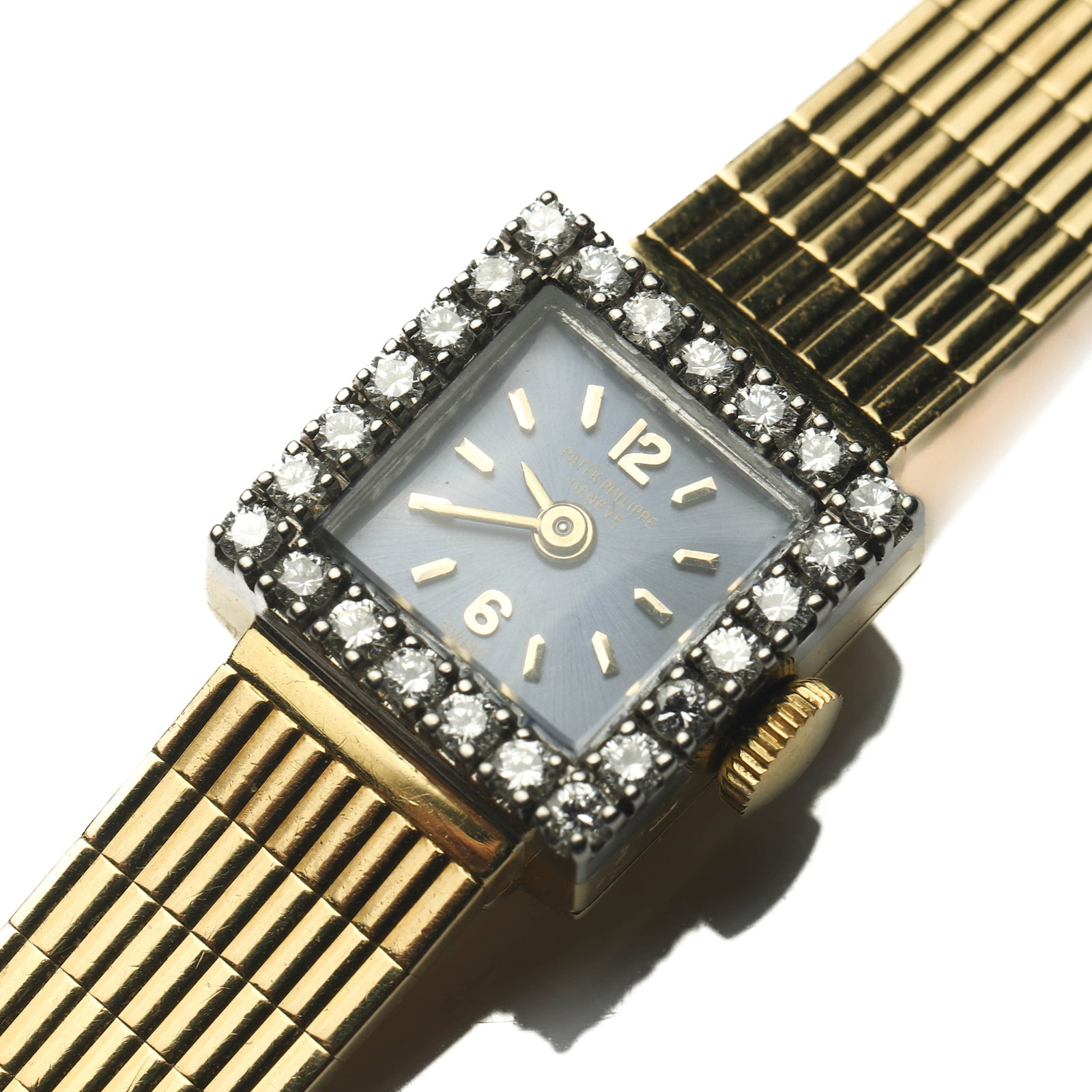PATEK PHILIPPE & CO. 18K GOLD LADY'S DIAMOND MANUAL WIND WRISTWATCH: Dimensions Case Width: 5/8 in. (16.3 mm) Overall Length: 6 7/8 in. (17.5 cm) Weight: 36.9 g Description A Patek Philippe & Co., Genève lady's manual wind wristwatch, crafted in 18K yellow gold, featu