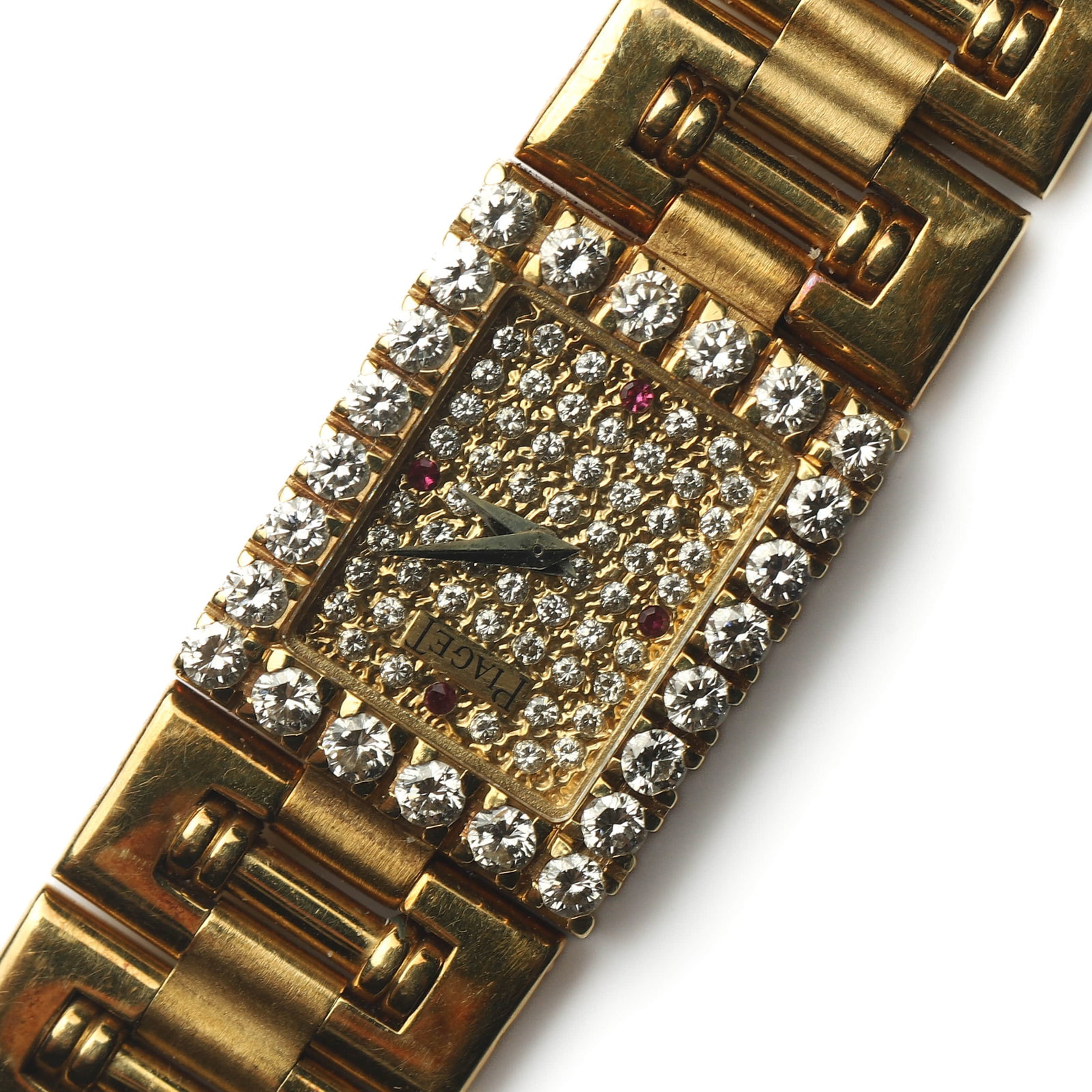 PIAGET 18K GOLD DIAMOND-SET QUARTZ LADY'S BRACELET WATCH: Dimensions Overall Length: 6 11/16 in. (17 cm) Case Width: 9/16 in. (14.7 mm) Weight: 54.9 g Description An elegant Piaget lady's 18K gold quartz bracelet wristwatch featuring an integrated solid gold