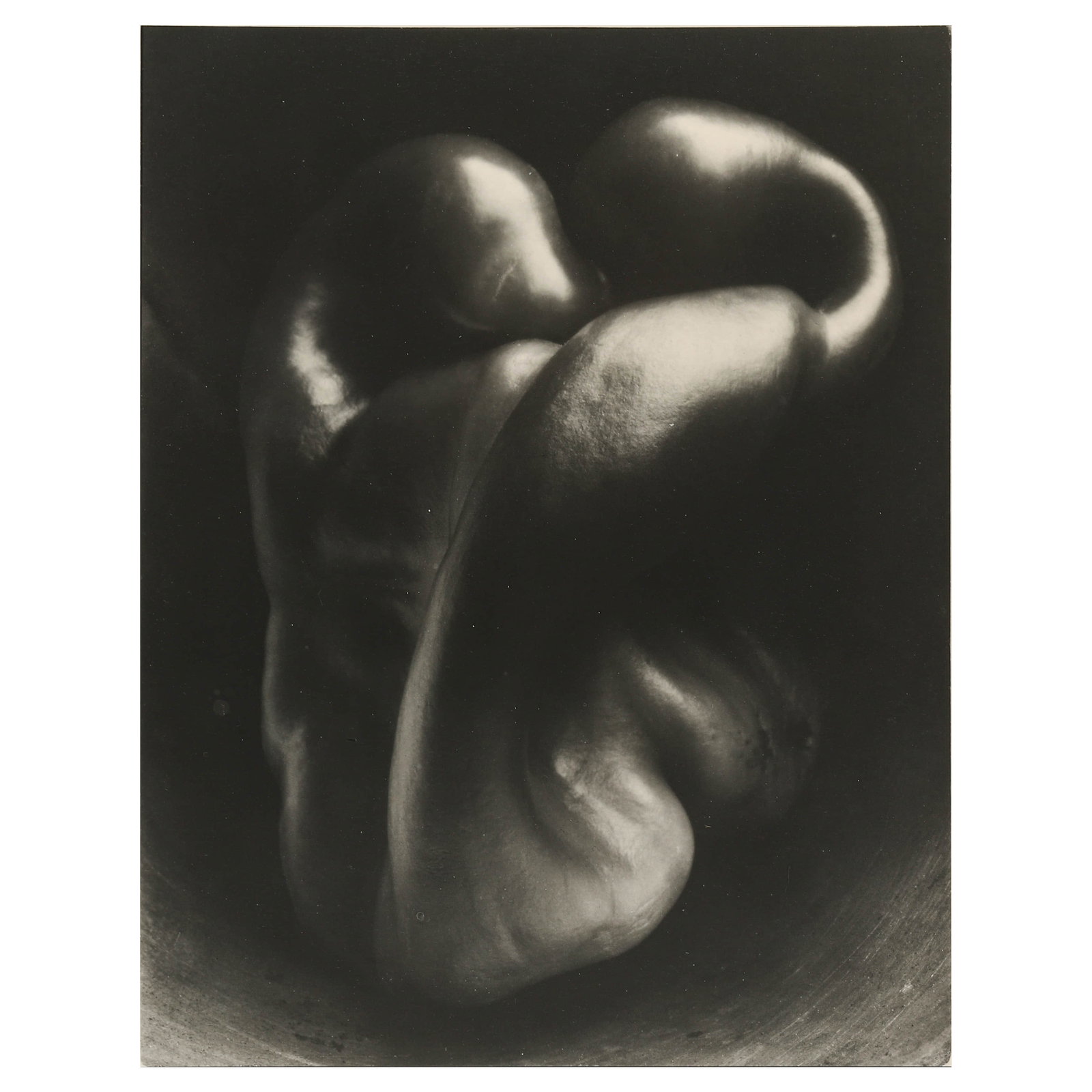 EDWARD WESTON (1886–1958), PEPPER NO. 30: Artist Edward Weston Title PEPPER NO. 30 Medium Silver gelatin print, mounted on board Signature Stamped and signed in pencil on verso Dimensions Image 7.32 × 9.41 in. (18.6 × 23.9 cm); Frame 15.75 