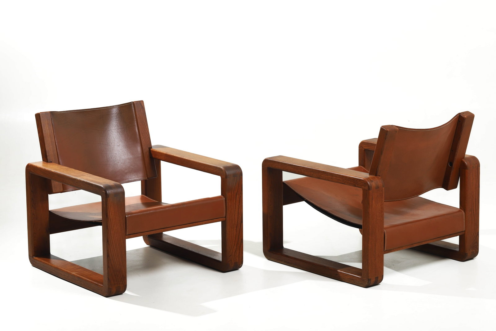 PAIR OF MID-CENTURY MODERN OAK AND LEATHER LOUNGE CHAIRS (1 of 7)