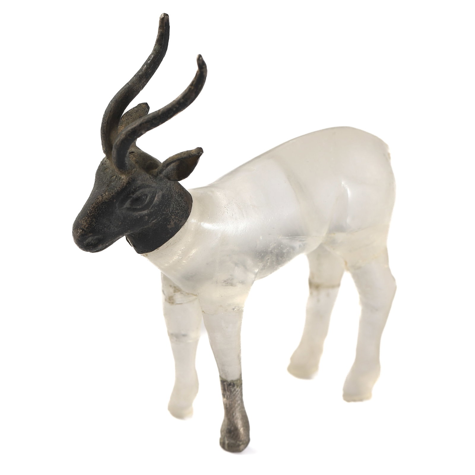 ANCIENT ROMAN CRYSTAL RAM SCULPTURE WITH SILVER HEAD: Dimensions Length 2 3/4 in (7 cm)Width 63/64 in (2.5 cm)Height 3 5/32 in (8cm) Weight 47.2 g Description Ancient Roman Period (753 BC–476 AD). A finely carved crystal ram sculpture featuring a