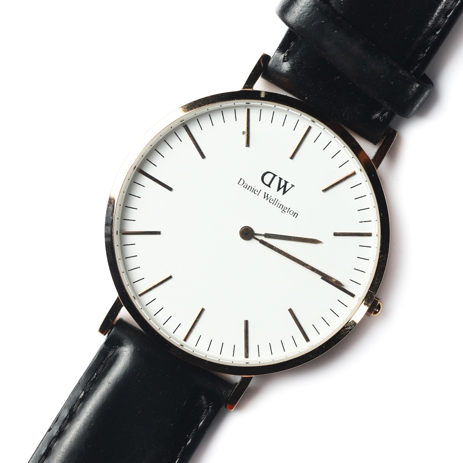 DANIEL WELLINGTON STAINLESS STEEL QUARTZ WRISTWATCH: Dimensions Dial diameter 1 11/16 in. (42.9 mm) Overall length 9 1/4 in. (23.5 cm) Description A Daniel Wellington stainless steel quartz wristwatch, featuring a white dial signed with the "DW" logo