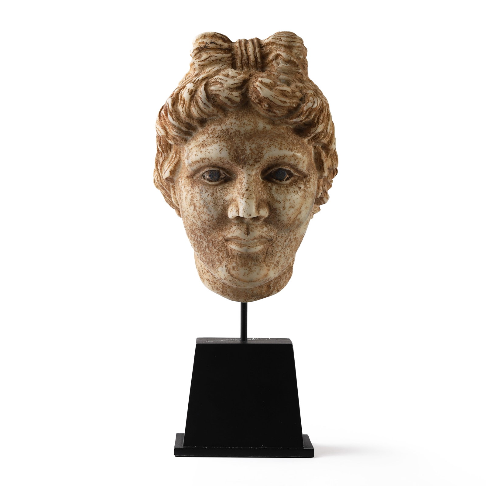 A STONE RELIEF MEDALLION WITH PROFILE OF A BEARDED MAN: Height: 6 1/2 in. (16.5 cm) This stone relief sculpture presents a striking profile of a classical male figure, carved in high relief with finely modeled features. The subjectâ€™s bearded face, c
