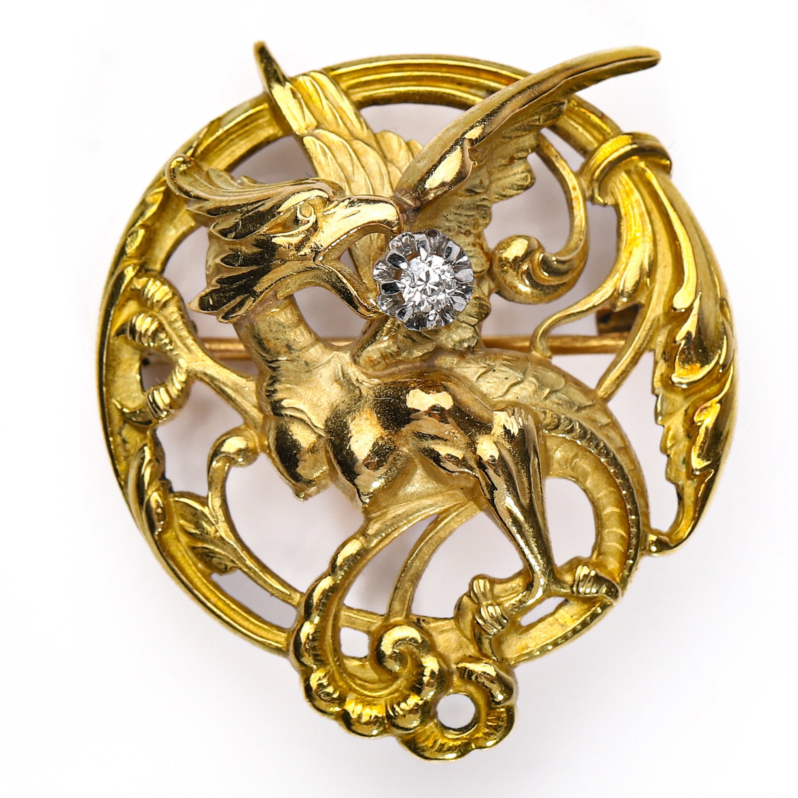 FRENCH ART NOUVEAU GOLD CHIMERA DRAGON BROOCH: Dimensions Length: 1 5/16 in. (32.6 mm); Weight: 8.9 g Description A striking French Art Nouveau brooch, finely handcrafted in high-carat gold, depicting a mythical chimera or winged dragon in