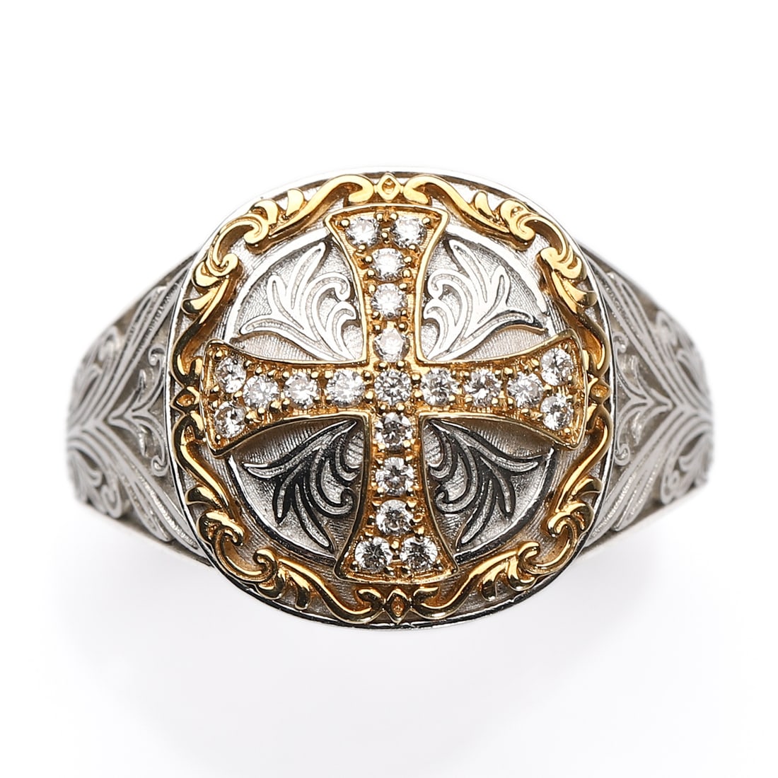 A DIAMOND-SET CROSS RING, IN PLATINUM AND 18K GOLD: Centering a Latin cross motif pavé-set with round brilliant-cut diamonds, within a gold scrollwork border, mounted in platinum and 18K yellow gold (stamped Pt950 and K18). Dimensions: Inner diameter: