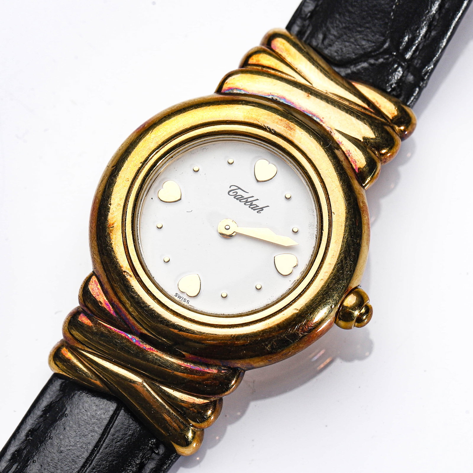 TABBACH "COPACABANA" SWISS QUARTZ WRISTWATCH: Dimensions Overall length approx. 8 5/8 in (22 cm).Dial diameter approx. 1 1/8 in (28.4 mm). Description A Swiss-made quartz wristwatch by Tabbach, model "Copacabana," featuring a white dial with appl