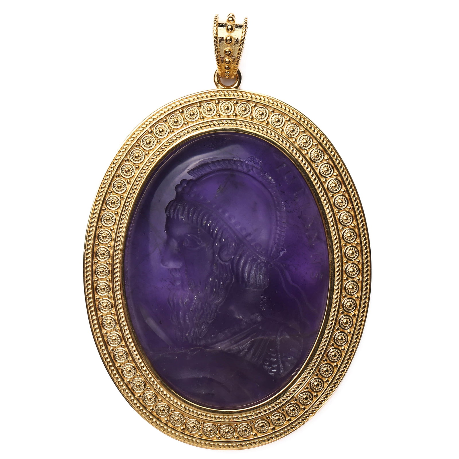 18K GOLD AND CARVED AMETHYST INTAGLIO PORTRAIT PENDANT: Dimensions Height 2 1/2 in. (63.1 mm) Width 1 5/8 in. (41.6 mm) Weight 25.7g Description An impressive 18K gold pendant centered with a large oval purple amethyst intaglio, finely carved with the prof