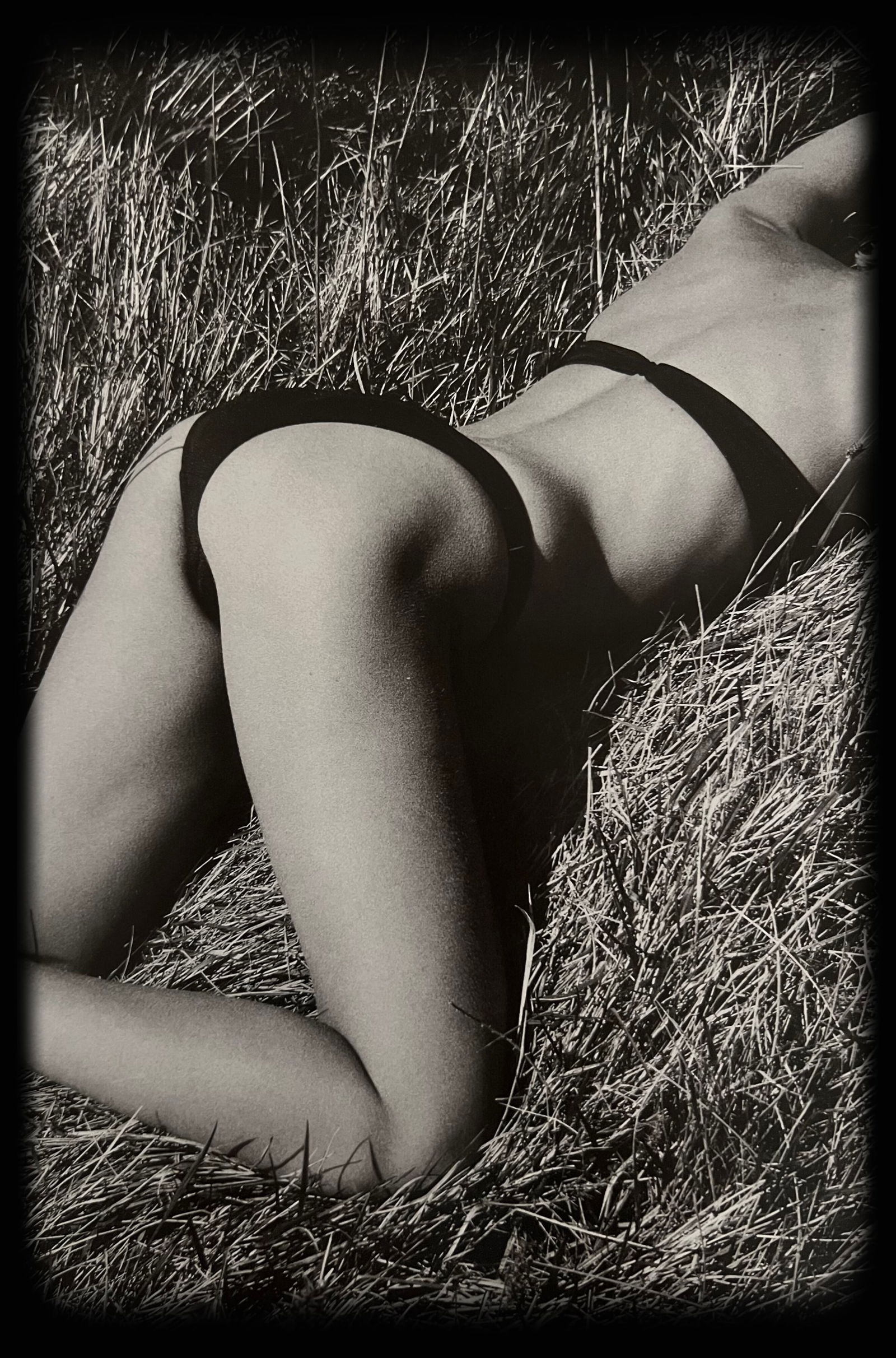 Jeanloup Sieff, A Back In The Sun, Normandie 1985: Photographer: Jeanloup Sieff (French, 1933 - 2000) - French photographer critically acclaimed for his portraits, landscapes, nude studies, and fashion imagery. He often made use of a wide-angle lens,