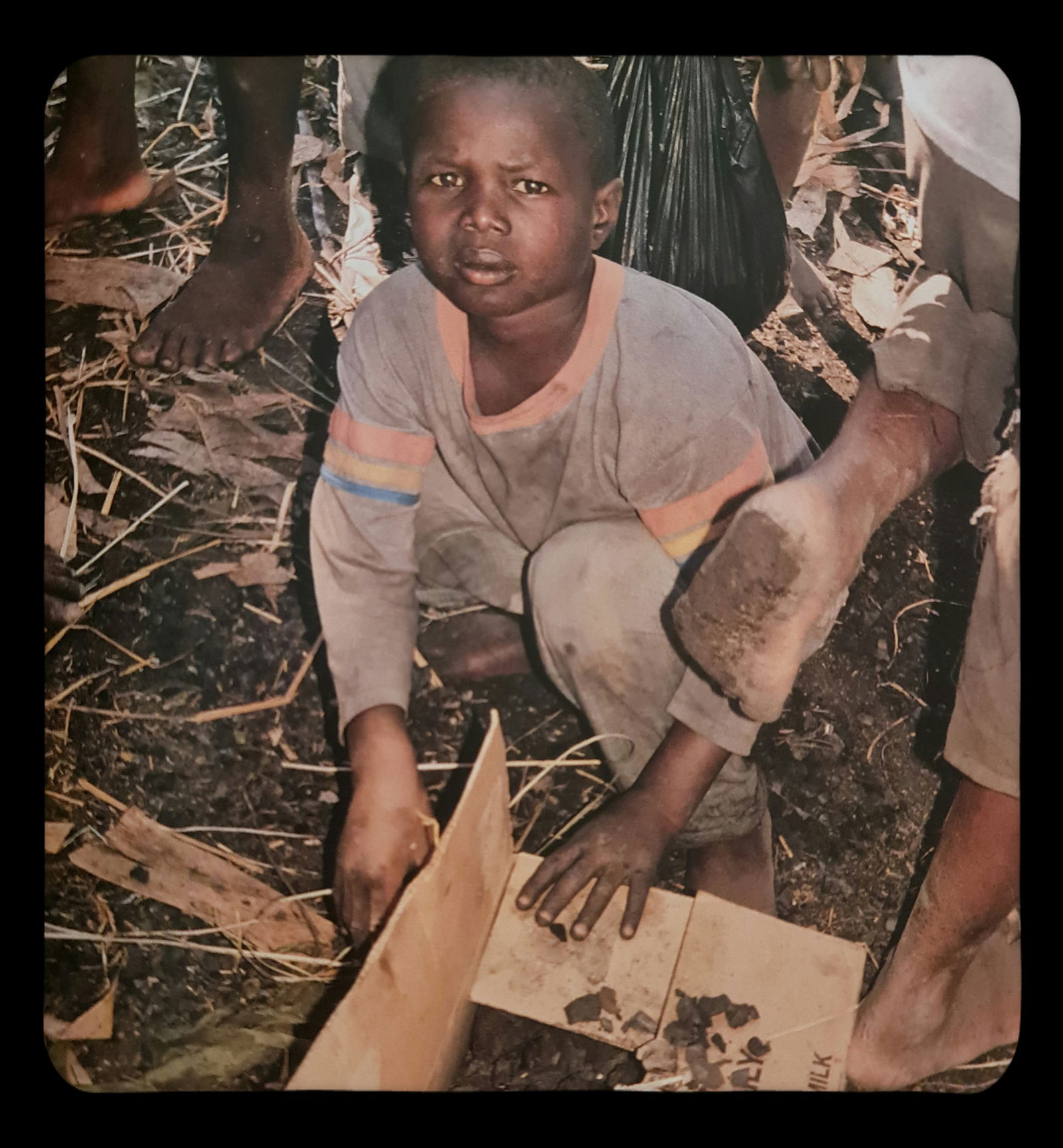 Michel Compte, Children collecting charcoal for fires, Haiti, 1997: Photographer: Michel Comte (born 19 February 1954) is a Swiss artist, filmmaker, fashion and portrait photographer. Subject/Title: Frida Kahlo Date Of Negative: 1997 Type Of Print: Sheet Fed Photograv