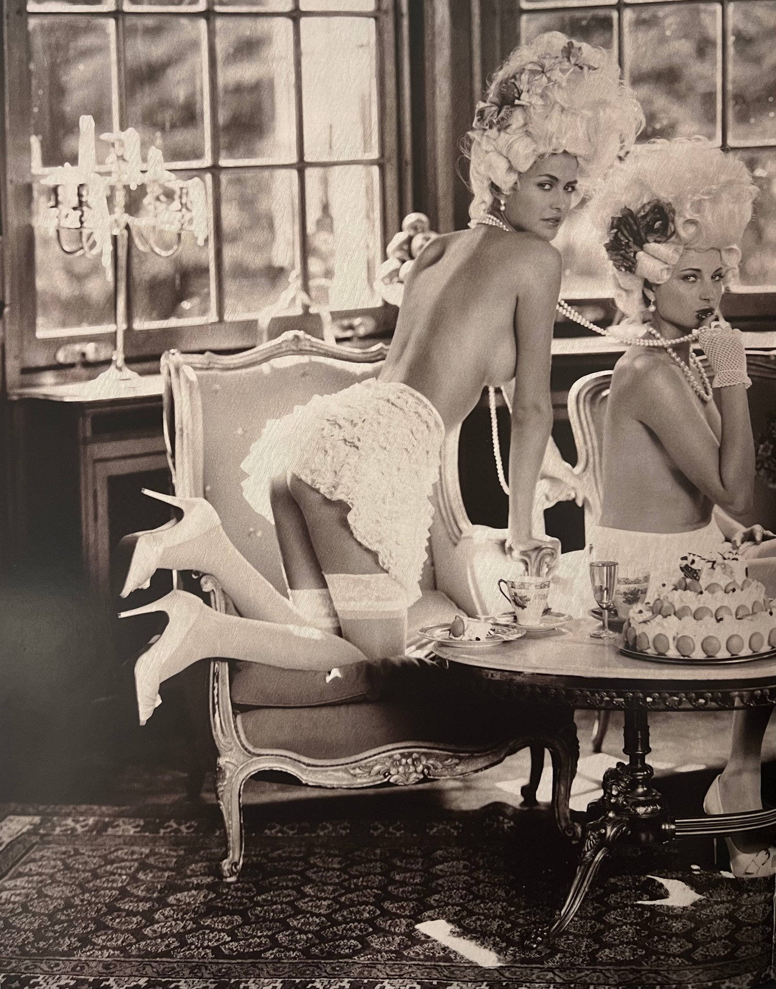 Marc Lagrange, Pompadour High Tea, 2008: Photographer: Marc Lagrange was a Belgian photographer known for his nude portraits of female figures. Lagrange created dream-like and fantastical narrative pictures populated by beautiful nudes that 