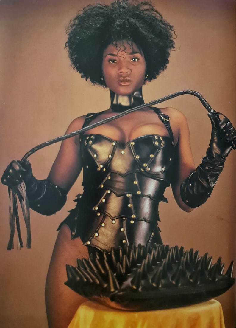 Eric Kroll, Girl with whip, 1990's: Photographer: Eric Kroll - 1946 (age 75 years), Eric David Kroll is a fetish photographer, erotica historian and book editor who has lived in New York, San Francisco, and Los Angeles. Subject/Title: G