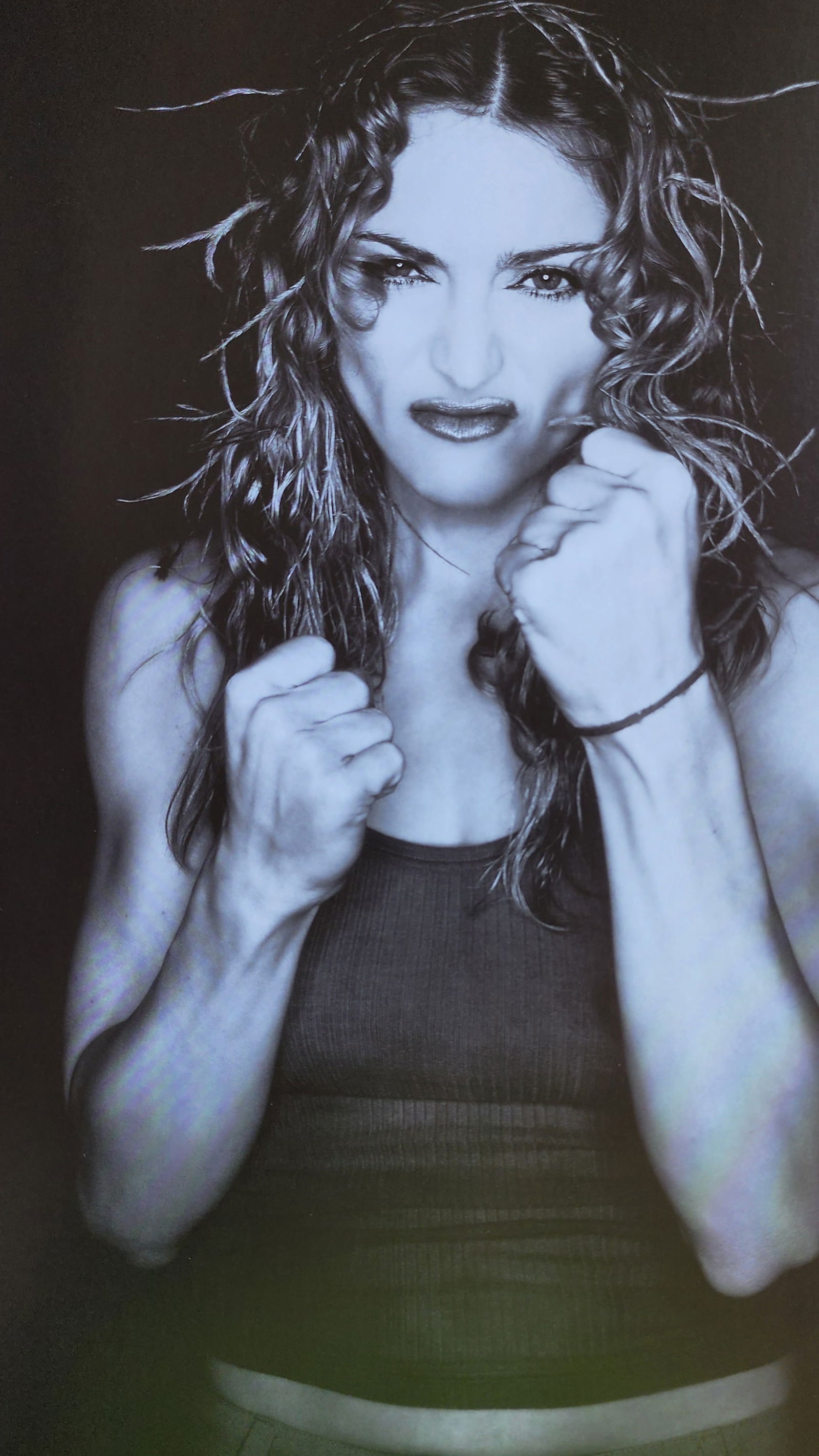 Rankin 'Madonna' 2033: John Rankin Waddell (1966), also known under his working name Rankin, is a British portrait and fashion photographer and director. Best known as the founder of Dazed and Confused magazine, and for his