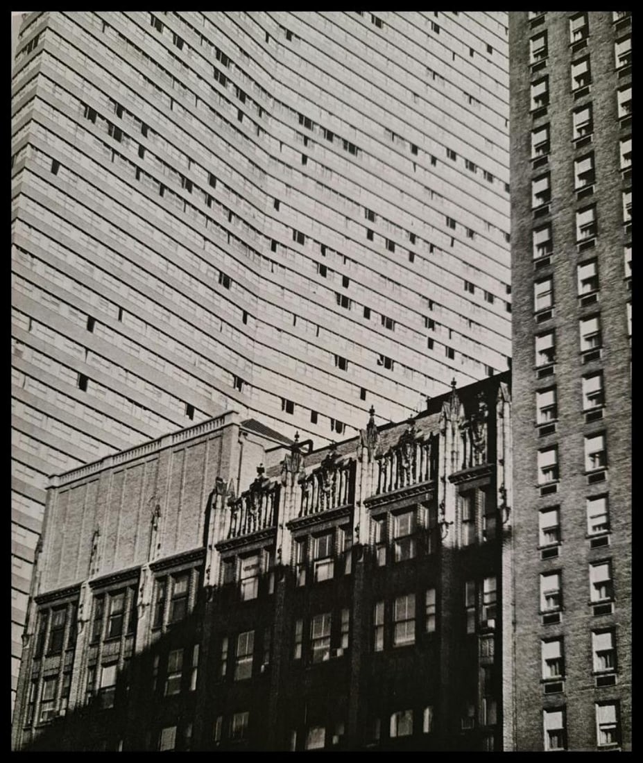 André Kertész, Buildings, New York, 1962: Photographer: André Kertész, born Andor Kertész, was a Hungarian-born photographer known for his groundbreaking contributions to photographic composition and the photo essay. Subject: Buildings, Ne