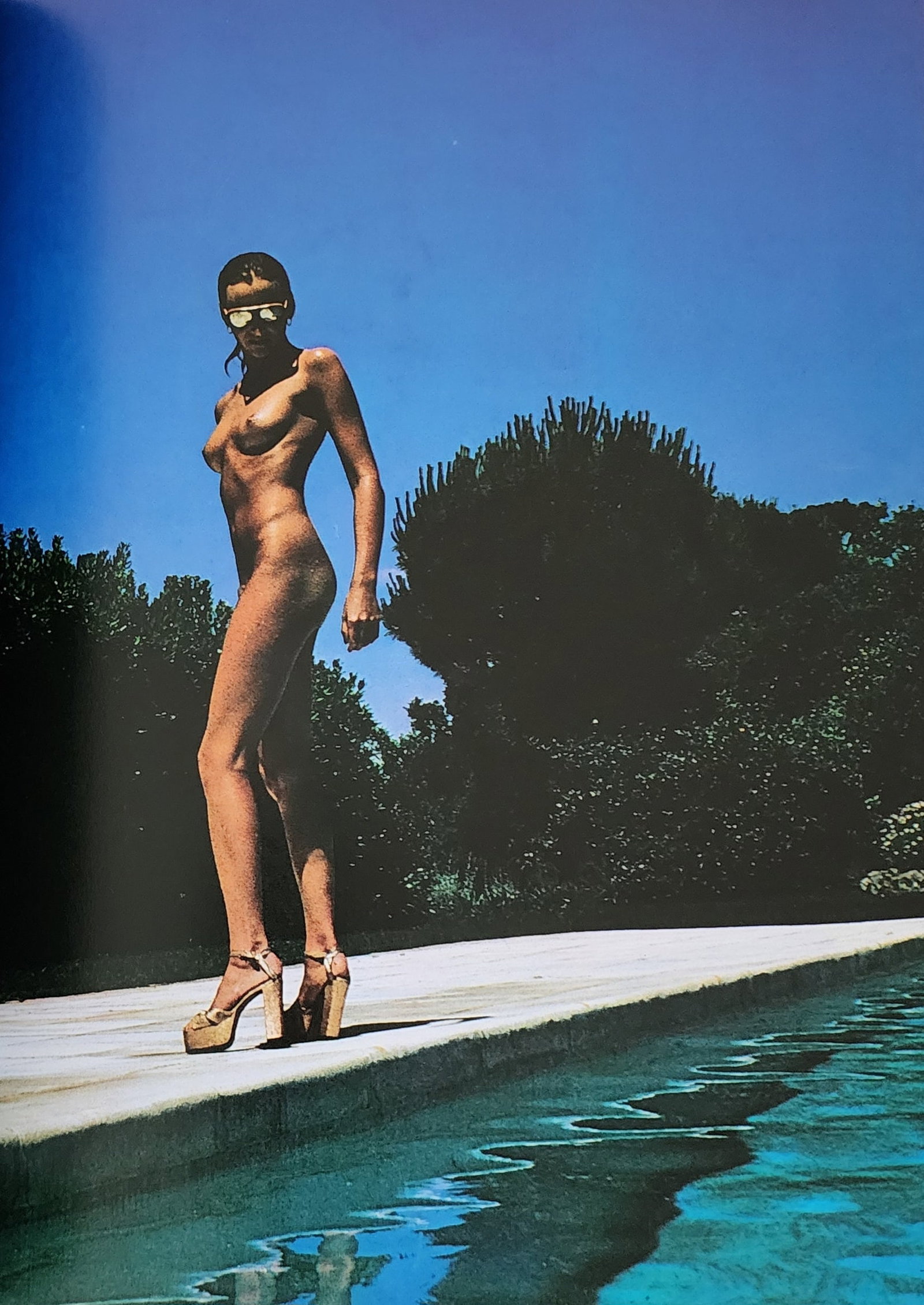 Helmut Newton - Erotic,1976: Photographer: Helmut Newton Title/Subject: Erotic Date Of Negative: 1971 - 1975 Type Of Print: Authentic Sheet Fed Photogravure/Heliogravure. Date Of Print: 1976 Paper: Medium weight, satin/matte fini