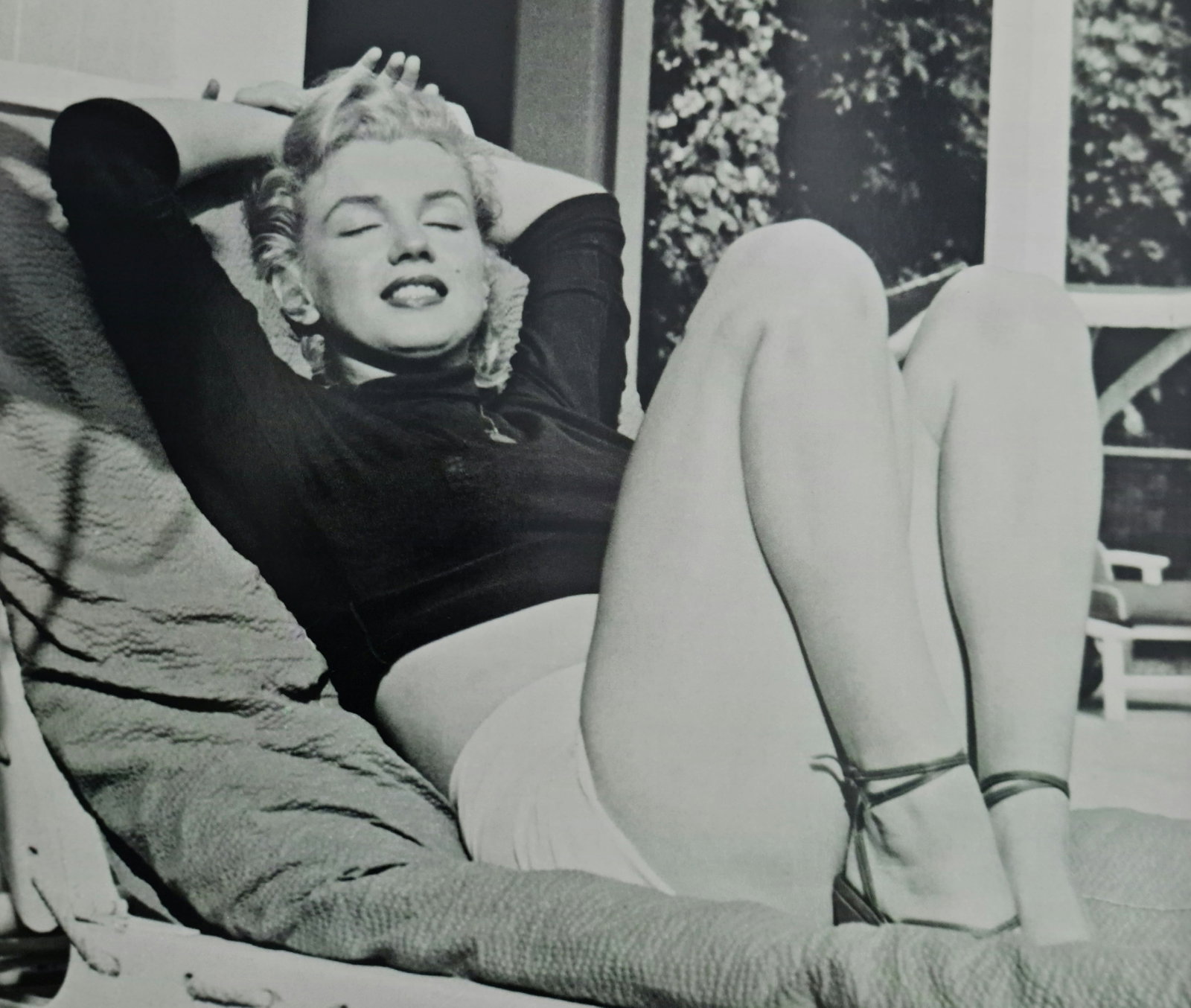 Title: Marilyn Monroe relaxing in the sunshine Year: Circa 1950's Size: 9" x 8" Medium: Duotone: Title: Marilyn Monroe relaxing in the sunshine Year: Circa 1950's Size: 9" x 8" Medium: Duotone Photo Engraving Publisher: Parragon Published: 2008 Condition: Excellent Certificate of Authenticity inc