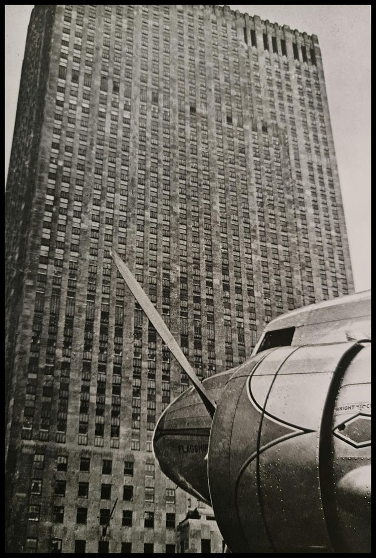 André Kertész, Airplane and building, New York, 1939: Photographer: André Kertész, born Andor Kertész, was a Hungarian-born photographer known for his groundbreaking contributions to photographic composition and the photo essay. Subject: Airplane and