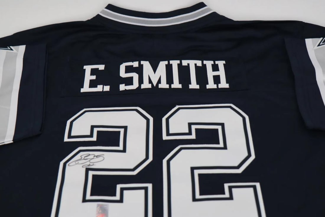 Emmit Smith Hand Signed Jersey with Emmit Smith Hologram Seal: Athlete: Emmit Smith Type: Football Jersey Size: Large Signed: Hand Signed Authentication- Comes With Emmit Smith Authentication Seal Condition: Brand New (Never Worn)