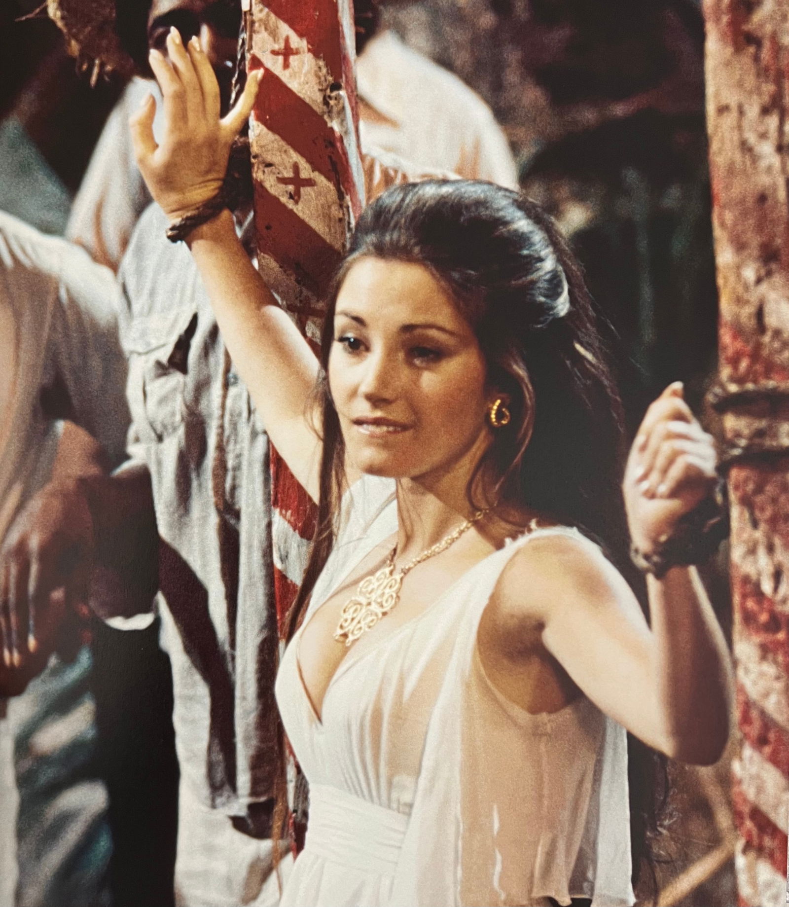 Terry O'Neill, Solitaire Awaits Rescue On The Set Of Live And Let Die, 1973: Photographer: Terry O’Neill CBE (30 July 1938 – 16 November 2019) was a British photographer, known for documenting the fashions, styles, and celebrities of the 1960s. Title: Solitaire Awaits Resc