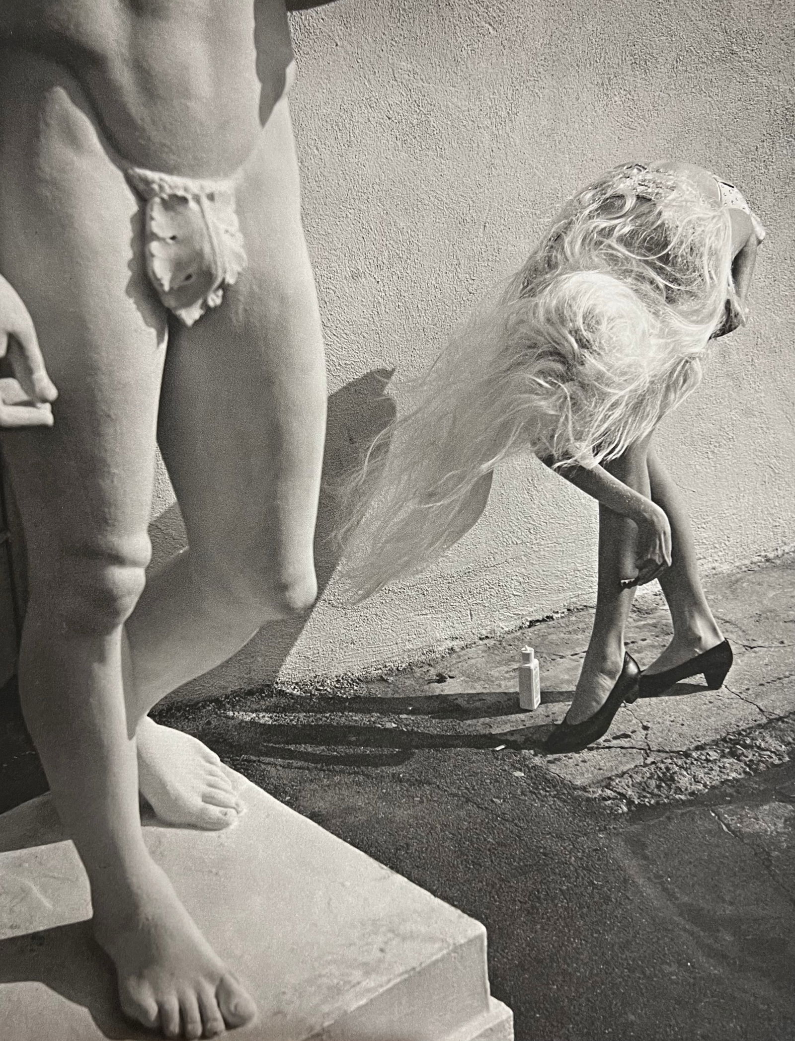 Bruce Weber, Woman near statue, 1988: Photographer: Bruce Weber (American, b. 1946) - internationally renowned American fashion photographer best known for his racy, erotically charged imagery. Weber has shot the ad campaigns of Calvin Kl