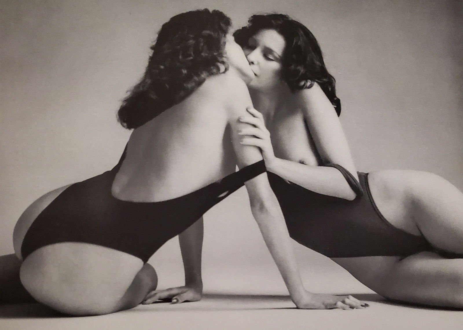 John Swannell, Girls Kiss, 1980's: Photographer: John Swannell was born in 1946. After leaving school at 16, he worked first as an assistant at Vogue Studios and then assisted David Bailey for four years before setting up his own studi
