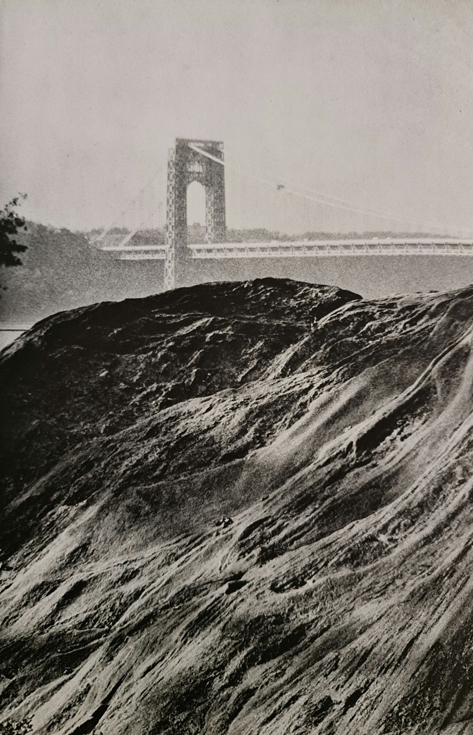 André Kertész, Hill and bridge, New York, 1962: Photographer: André Kertész, born Andor Kertész, was a Hungarian-born photographer known for his groundbreaking contributions to photographic composition and the photo essay. Subject: Hill and brid