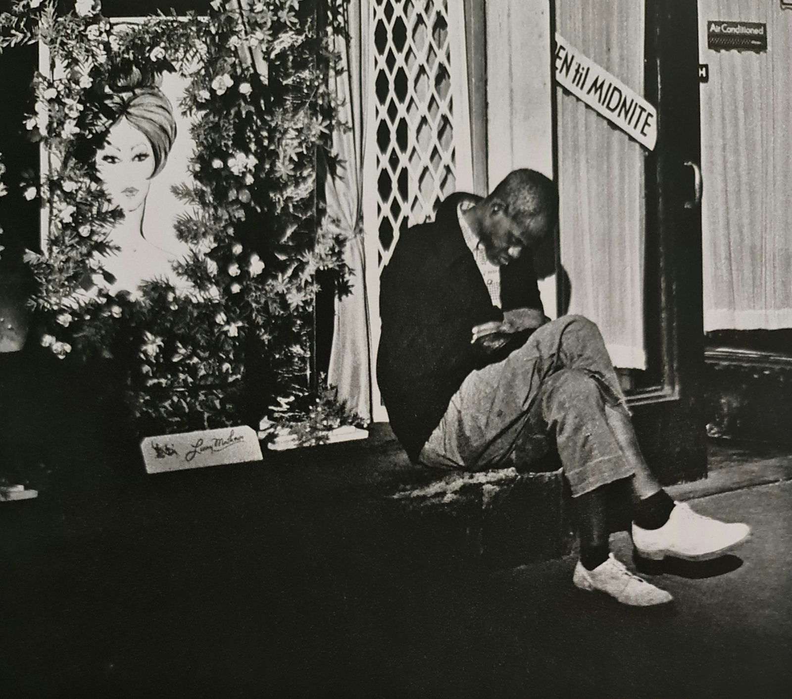 André Kertész, Man on stoop, New York, 1963: Photographer: André Kertész, born Andor Kertész, was a Hungarian-born photographer known for his groundbreaking contributions to photographic composition and the photo essay. Subject: Man on stoop,