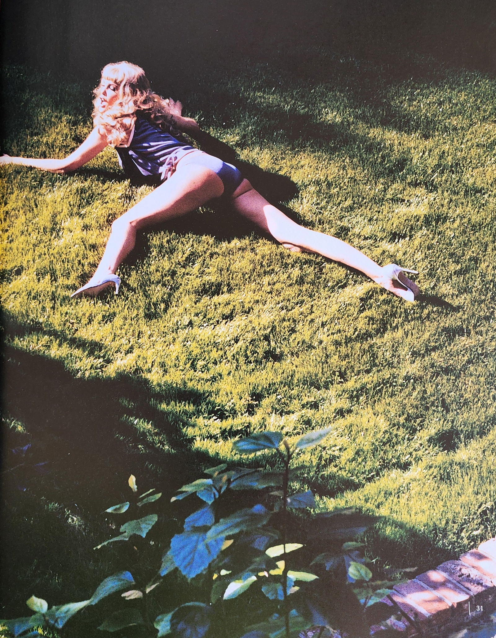 Rankin 'Julie Strain' 2003: John Rankin Waddell (1966), also known under his working name Rankin, is a British portrait and fashion photographer and director. Best known as the founder of Dazed and Confused magazine, and for his