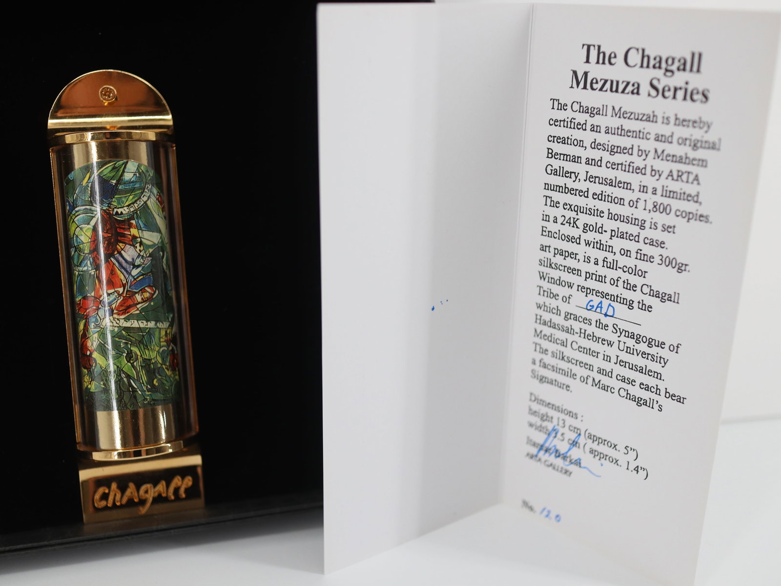 Marc Chagall,'Gad', 24K Gold Plated Limited Edition Mezuzah: Artist: Marc Chagall Medium: Mezuzah - Exquisite glass housing is set in a 24K gold plated bronze with full color silkscreen Title: "GAD" Size: 5" x 1.5" Weight: 7 oz. Limited Edition: Edition of 3000