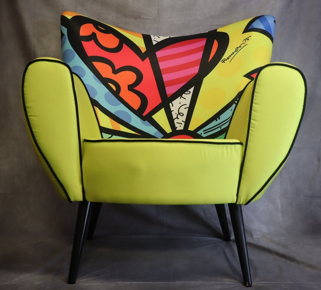 Romero Britto Limited Edition Pop Art Accent Arm Chair: PLEASE CALL TO REQUEST SHIPPING QUOTE BEFORE BIDDING - IN PERSON/LOCAL PICK-UP PREFERRED Artist: Romero Britto Medium: Upholstered designer chair with printed fabric Dimensions: Approx. 37"(H)x35"(W)x