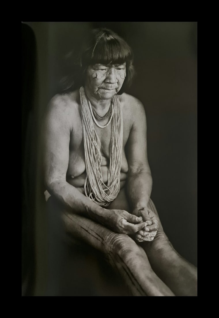Sebastian Salgado, During a womans Amuricuma ceremony, Mato Grosso, Brasil: Photographer: Sebastiao Ribeiro Salgado Junior is a Brazilian social documentary photographer and photojournalist. He has traveled to over 120 countries for his photographic projects. Most of these ha
