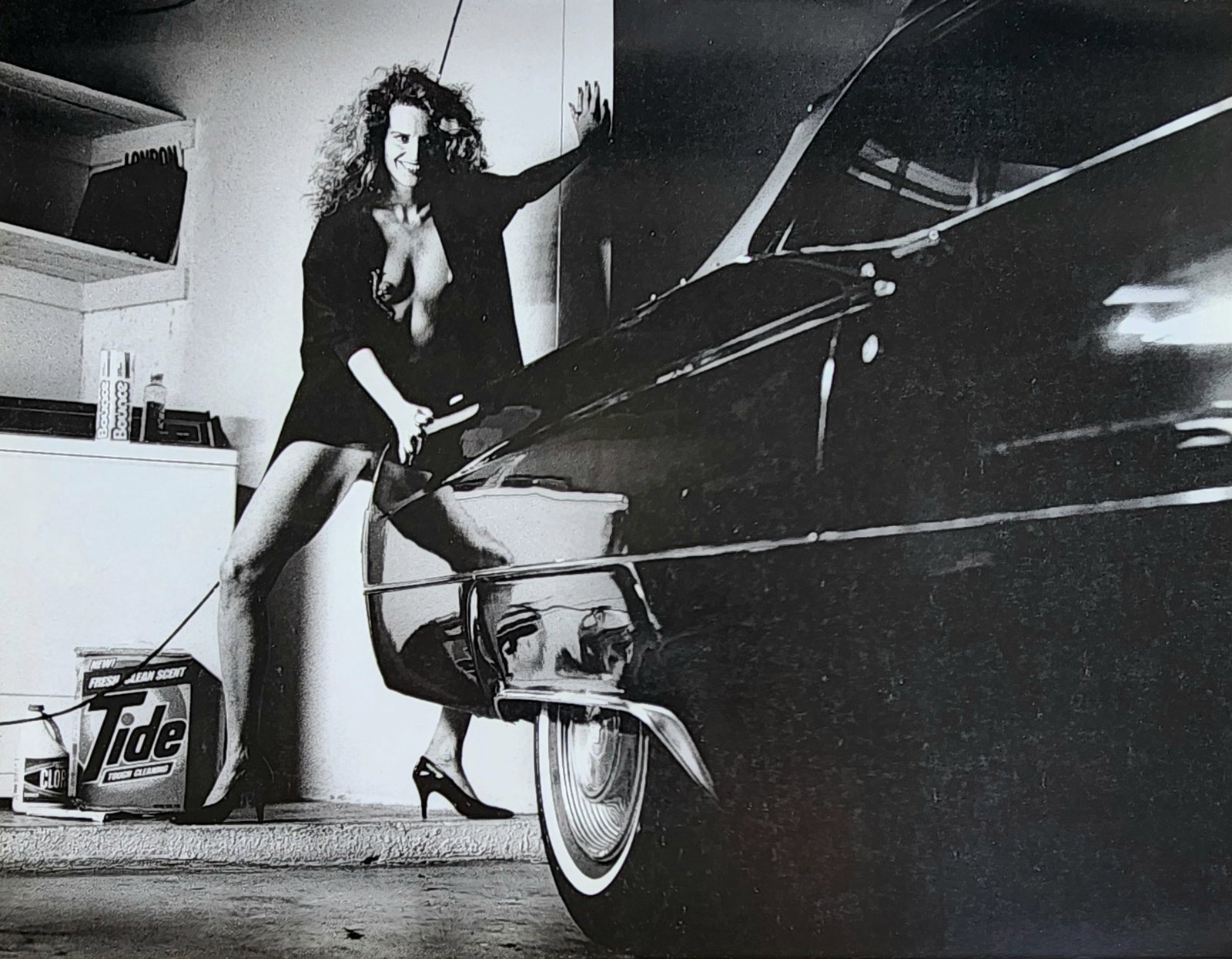 Helmut Newton 'Woman and Cadillac, Hollywood' 1987: Photographer: Helmut Newton (Germany, 1920 - 2004) - best known for his erotically charged highly stylized images, Helmut Newton was one of the most influential fashion photographers of all time. Titl