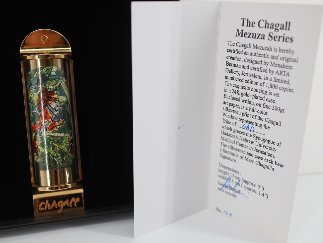 Marc Chagall, 'Gad', 24K Gold Plated Limited Edition Mezuzah w/ Silkscreen: Artist: Marc Chagall Medium: Mezuzah - Exquisite glass housing is set in a 24K gold plated bronze with full color silkscreen Title: "GAD" Size: 5" x 1.5" Weight: 7 oz. Limited Edition: Edition of 3000