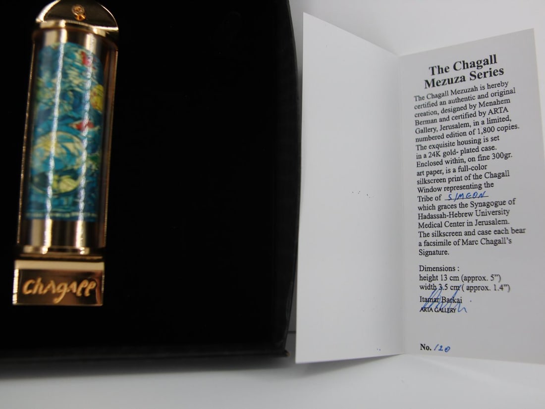 Marc Chagall, 'Simeon', 24K Gold Plated Limited Edition Mezuzah w/ Silkscreen: Artist: Marc Chagall Medium: Mezuzah - Exquisite glass housing is set in a 24K gold plated bronze with full color silkscreen TITLE: "SHIMON" (THE TWELVE TRIBES SERIES) Size: 5" x 1.5" Weight: 7 oz. Li