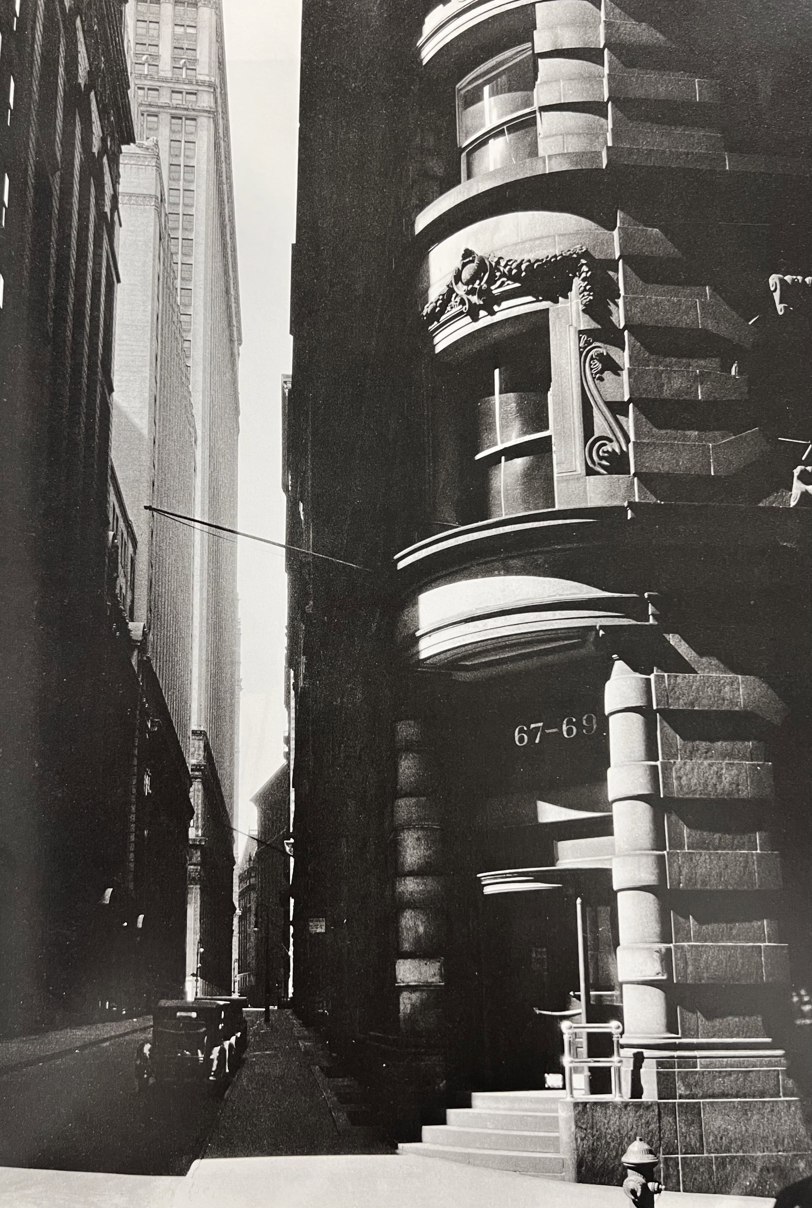 Berenice Abbott, Cedar Street From William Street, 1930s: Photographer: Berenice Alice Abbott was an American photographer best known for her portraits of between-the-wars 20th century cultural figures, New York City photographs of architecture and urban des