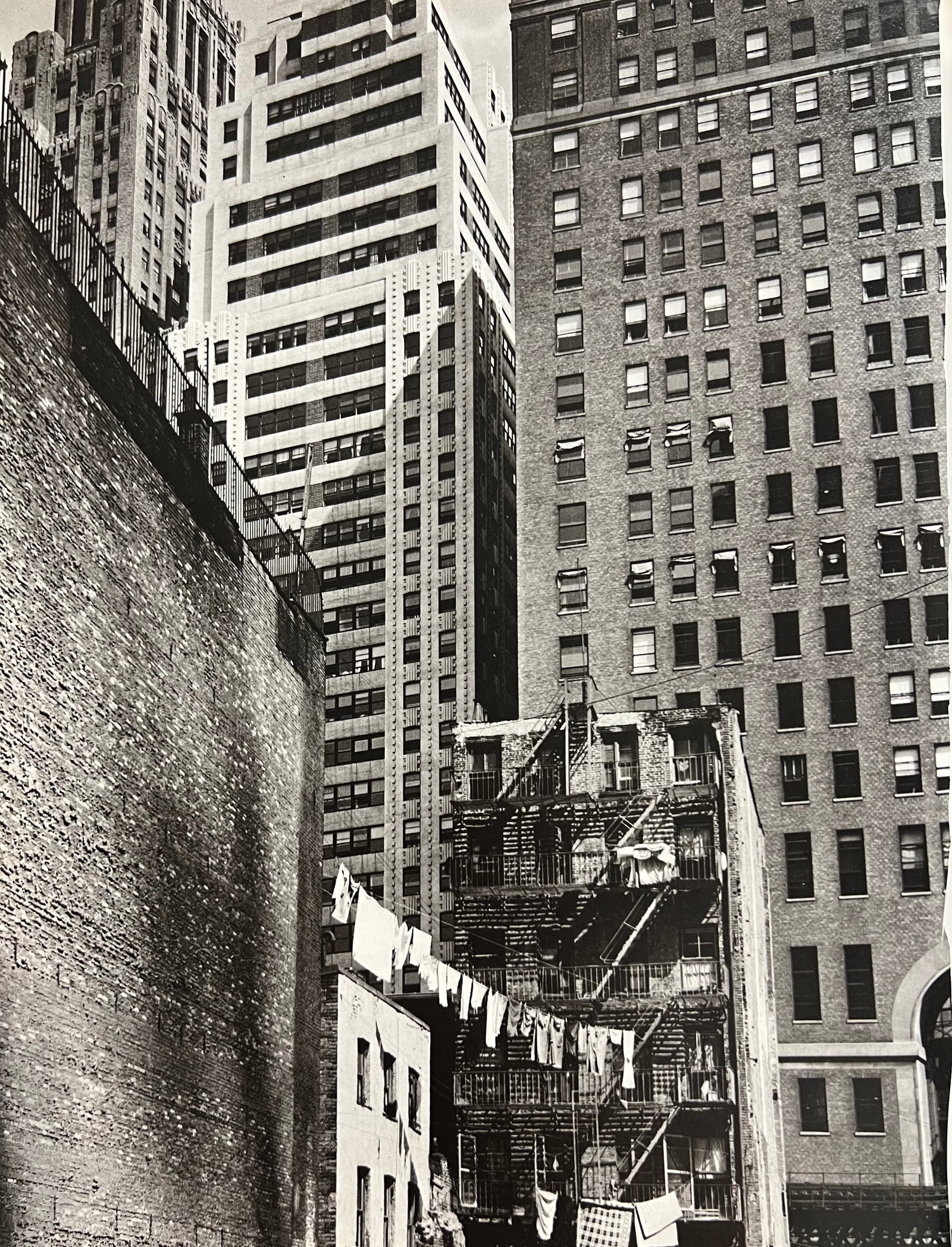 Berenice Abbott, Construction Old And New, 38 Greenwich Street, 1930s: Photographer: Berenice Alice Abbott was an American photographer best known for her portraits of between-the-wars 20th century cultural figures, New York City photographs of architecture and urban des