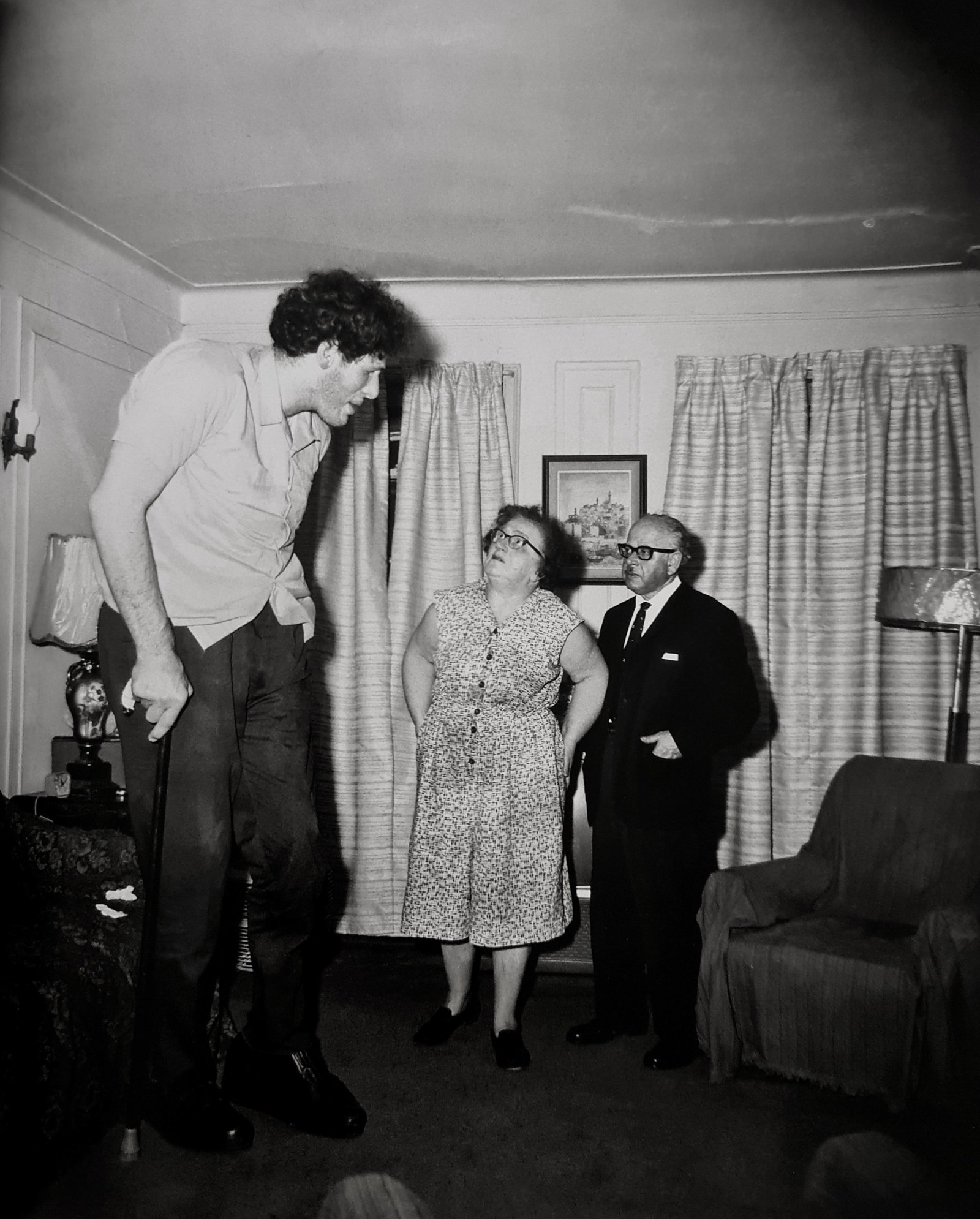 Diane Arbus, A Jewish giant at home with his parents in the Bronx, N.Y., 1970: Photographer: Diane Arbus Born: March 14, 1923, New York, New York, United States. Died: July 26, 1971, Westbeth Artists Housing, New York, United States. Diane Arbus was an American photographer. Arb