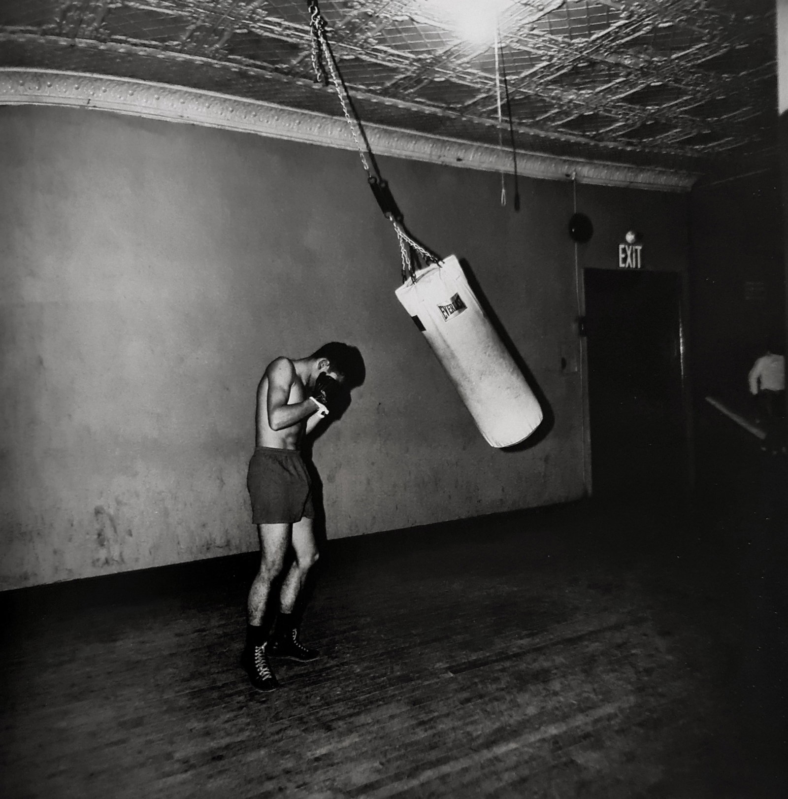 Diane Arbus, Boxer with a punching bag, N.Y.C., 1964: Photographer: Diane Arbus Born: March 14, 1923, New York, New York, United States. Died: July 26, 1971, Westbeth Artists Housing, New York, United States. Diane Arbus was an American photographer. Arb