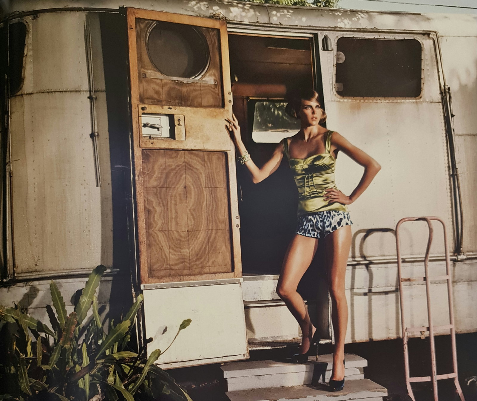 Jacques Olivar, Airstream Romance, Altadena, California, 2008: Photographer: Jacques Olivar, born in Casablanca in 1941, was an advertising photographer and movie director before embracing fashion photography. Visual seduction and cinematic sensibility are keys t